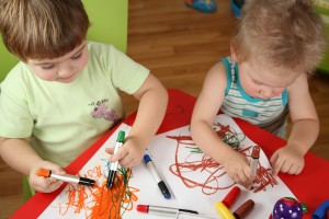 Two Children Drawing