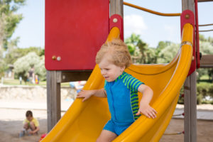 Toddler on Sliding Board