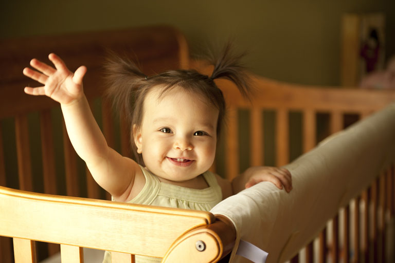 one-year-old-waving