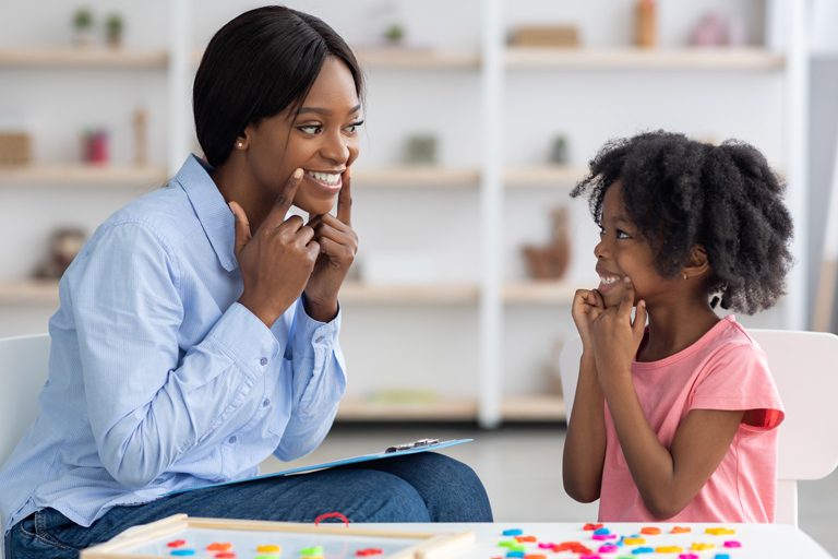 Picture of small child receiving early intervention therapy